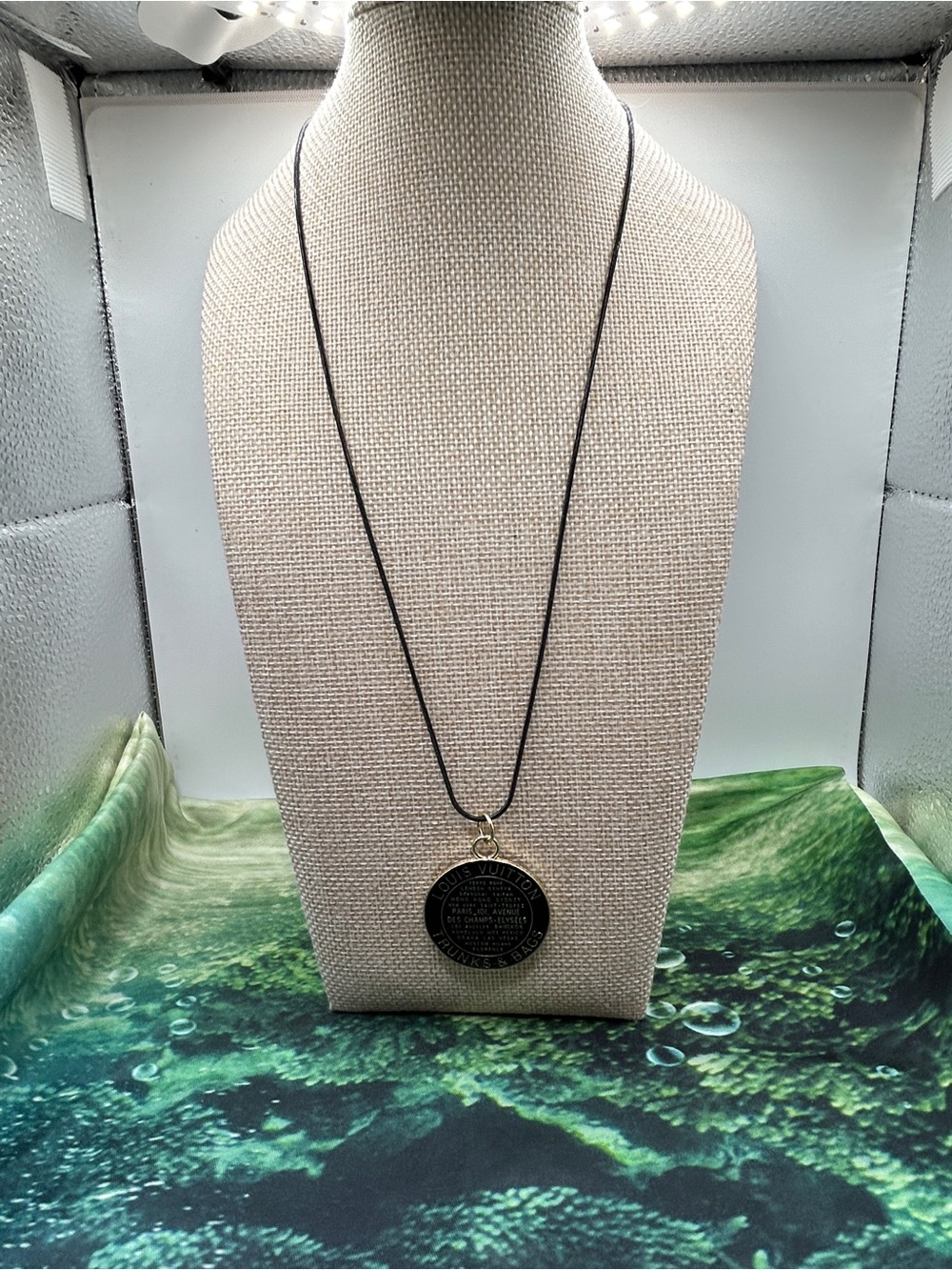 Louis Vuitton “Trunks and Bags” Round Pendant /Charm on Black Steel Chain. NIB